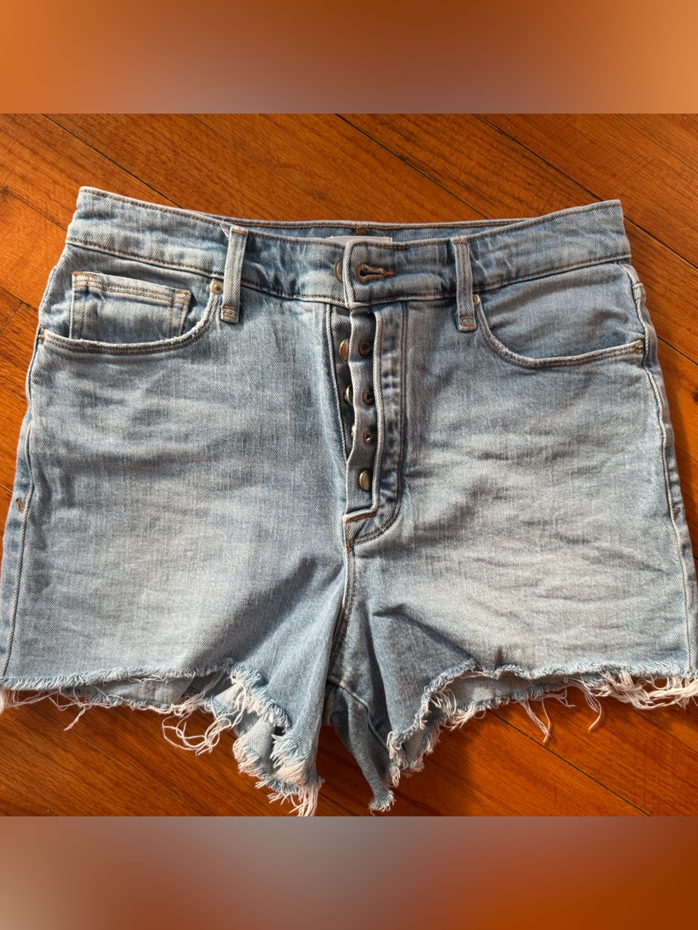 Good American Light Blue Distressed Denim Cutoff Shorts